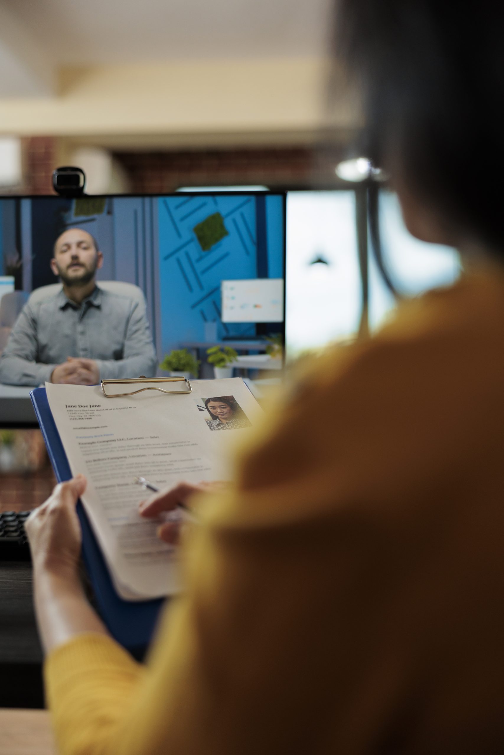 businesswoman analyzing candidate cv discussing hiring cv